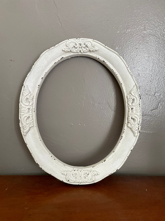 White Oval Frame