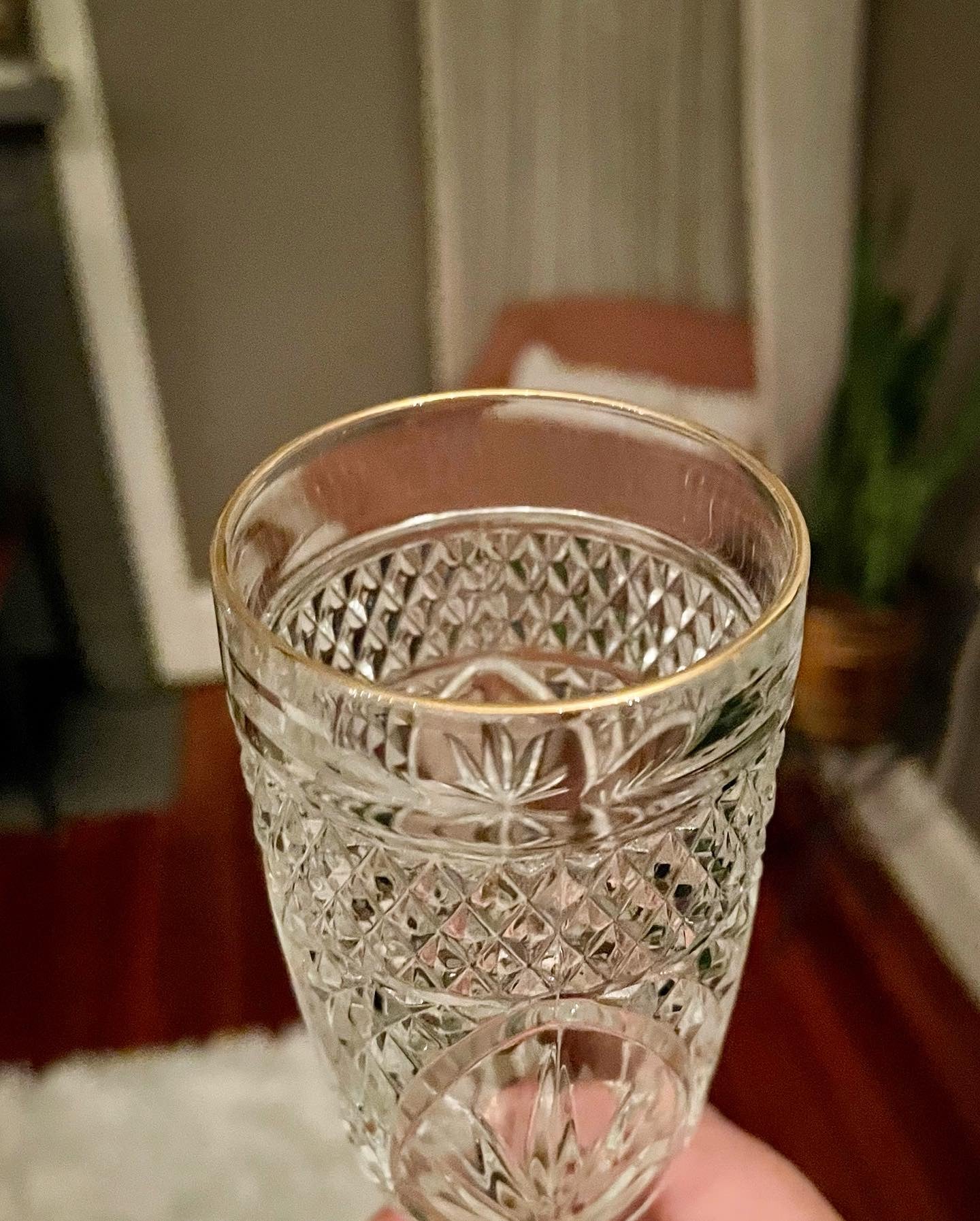 Gold-Rimmed Champagne Glasses